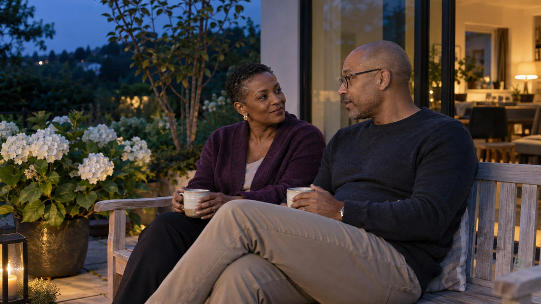 Couple enjoying tea on a terrace in the evening