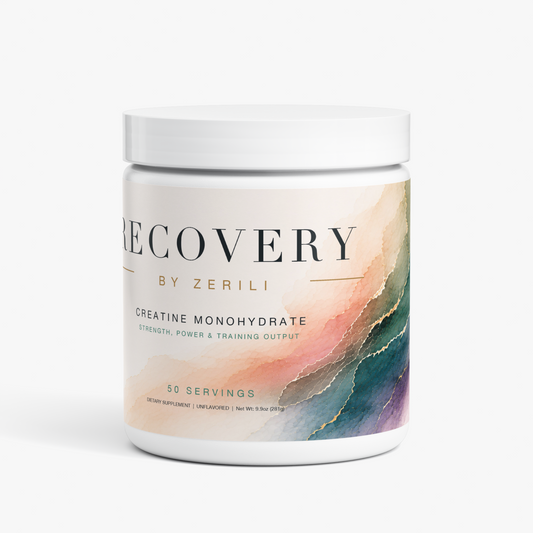 A white plastic tub of Recovery by Zerili Creatine Monohydrate powder, featuring a watercolor-style label with peach, teal, and gold accents on a clean white background.