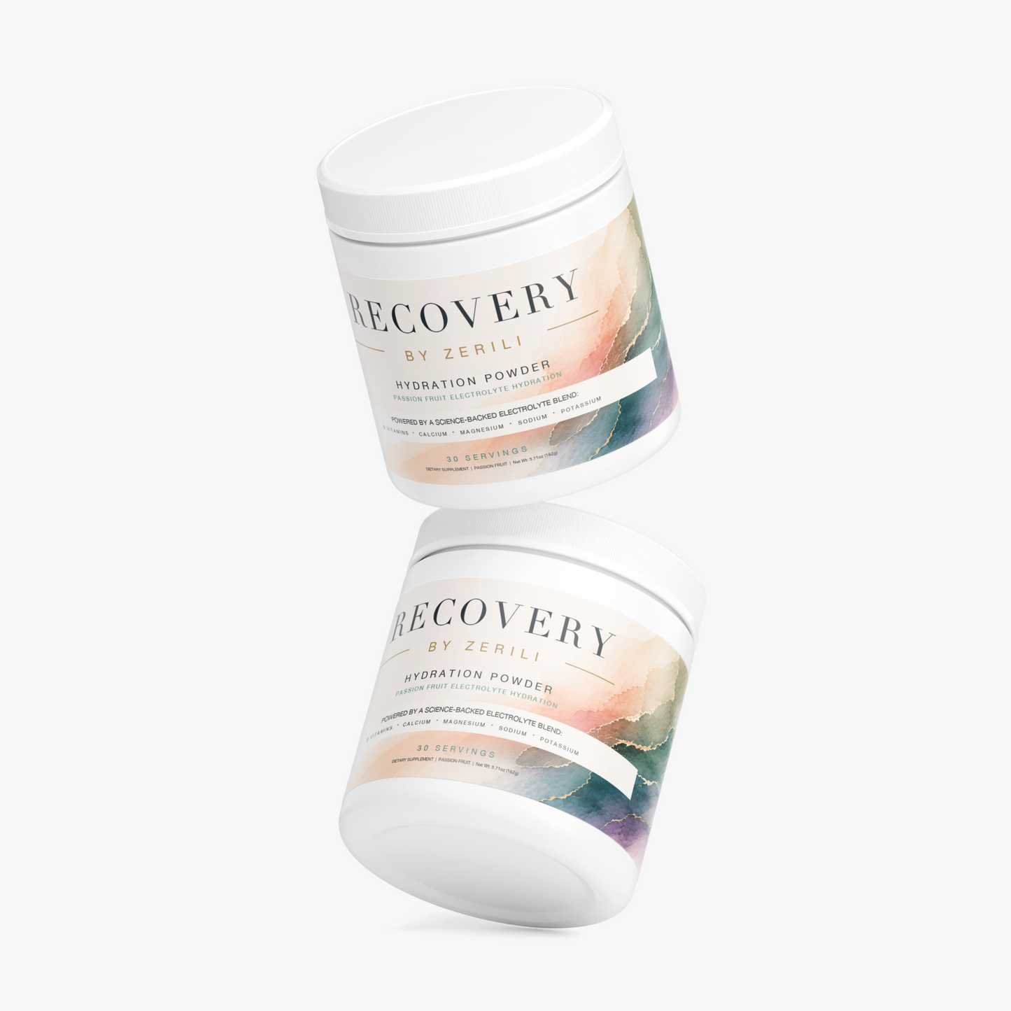 Two Recovery Hydration Powder (Passion Fruit) by Zerili tubs arranged at an angle on a light background.