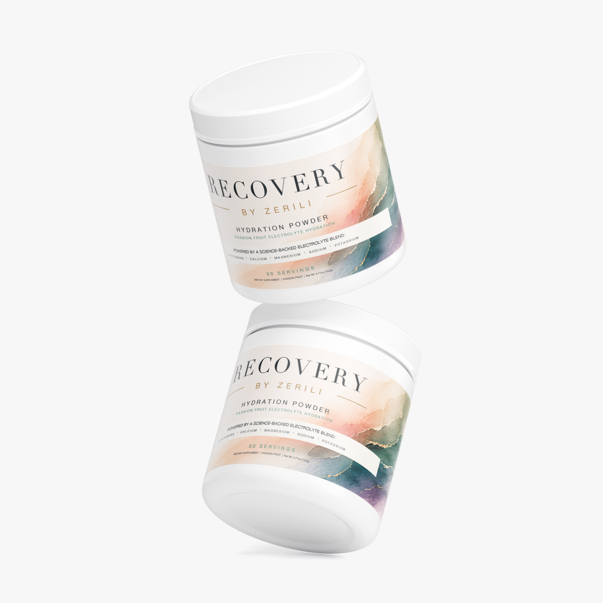 Two Recovery Hydration Powder (Passion Fruit) by Zerili tubs arranged at an angle on a light background.