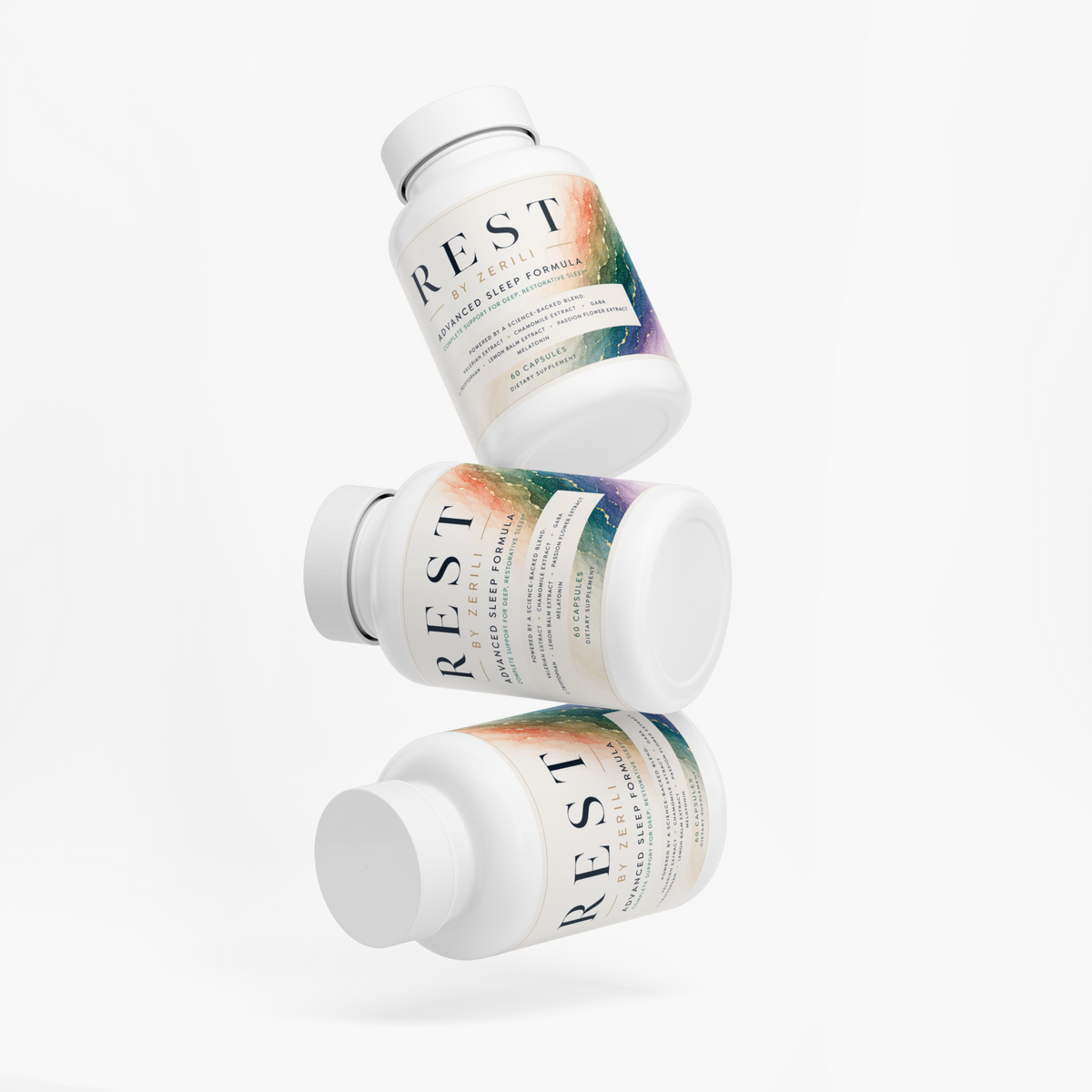 Three white Rest Advanced Sleep Formula by Zerili bottles arranged in a floating diagonal stack on a white background.